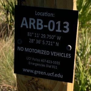 Arboretum location sign with longitude and lattitude